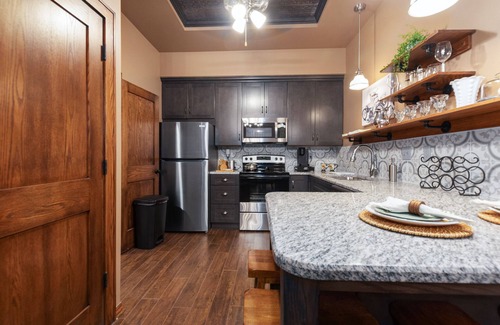 Wichita Apartment | The Sunflower Loft is located 1 block from Old Town in a 2 story brick building.