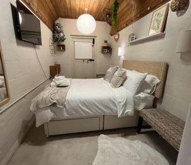 Churchtown House | The Telephone exchange very quaint hot tub stay
