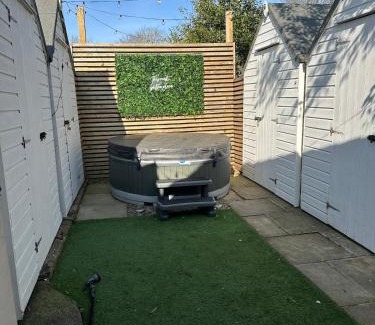 Churchtown House | The Telephone exchange very quaint hot tub stay