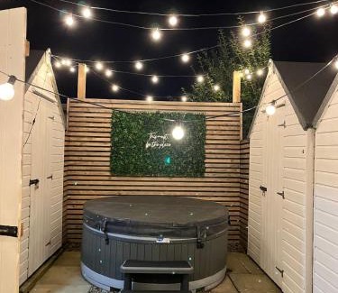 Churchtown House | The Telephone exchange very quaint hot tub stay