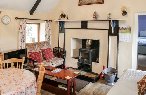 Carrowkennedy Cottage | THE THATCHED COTTAGE, pet friendly in Drummin, County Mayo