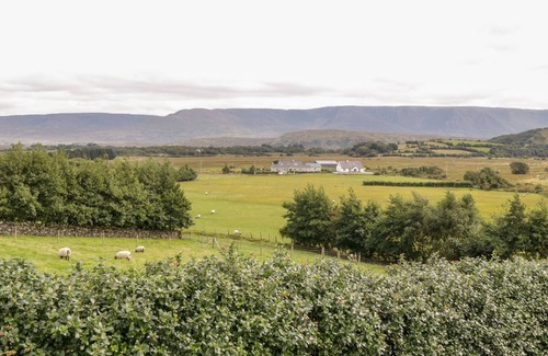 Carrowkennedy Cottage | THE THATCHED COTTAGE, pet friendly in Drummin, County Mayo