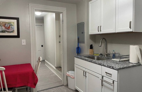 West Hill House | The Yellow-Shuttered House apt B