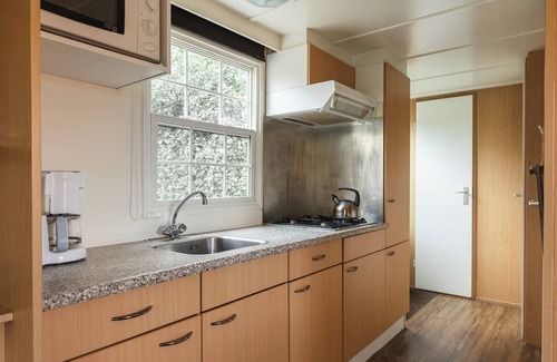 Zuna Cabin | This bungalow with hot tub has everything you need!
