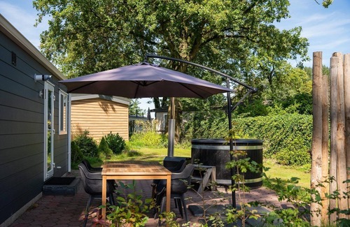 Zuna Cabin | This bungalow with hot tub has everything you need!