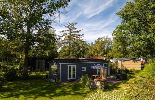 Zuna Cabin | This bungalow with hot tub has everything you need!