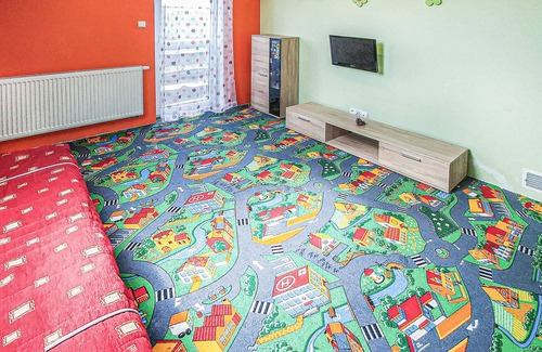 Lebcz House | This modern vacation home is located in the northeast of Poland with a garden, playroom and family-f