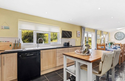 Haverfordwest Cottage | This spacious family home with glorious wood burner has all year round charm.