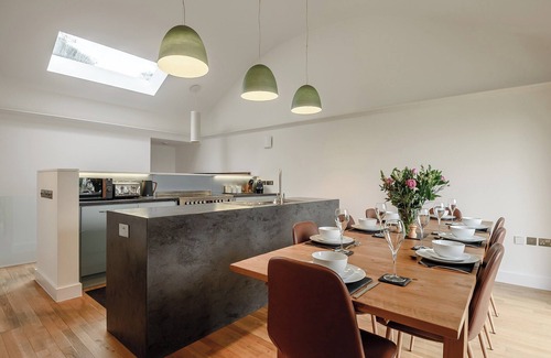 Arthog Cottage | This striking home is ideally located between the beach and the hills.