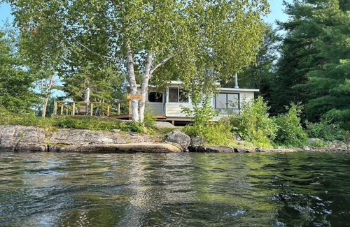 Crystal Falls Cabin | Timber Haven on the water's edge with your own private, sandy beach