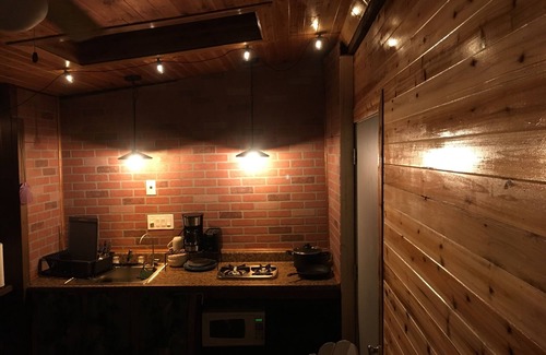 Fern Forest Cabin | tiny home 1- with kitchen equipped with essentials near at the Volcano Park!