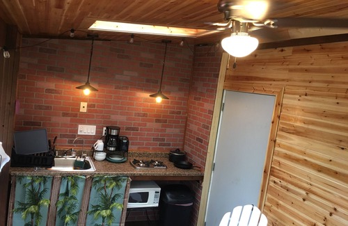 Fern Forest Cabin | tiny home 1- with kitchen equipped with essentials near at the Volcano Park!