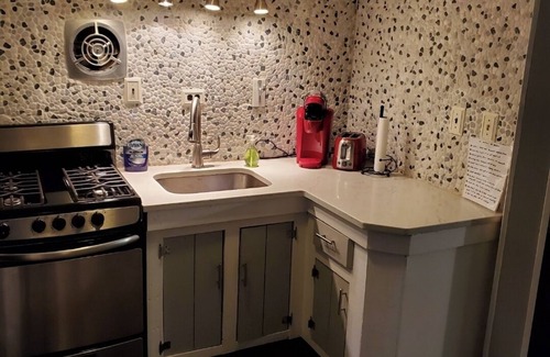 Wayland House | Tiny house experience steps to water.entire house