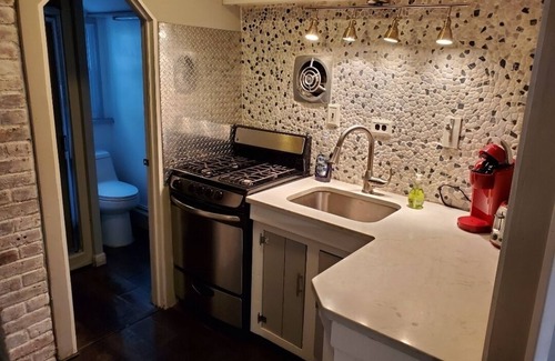 Wayland House | Tiny house experience steps to water.entire house
