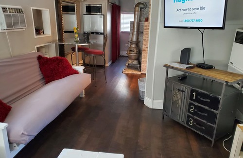 Wayland House | Tiny house experience steps to water.entire house