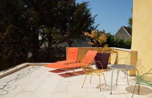 Dun-le-Palestel House | Tiny house-in town-bathroom-garden view