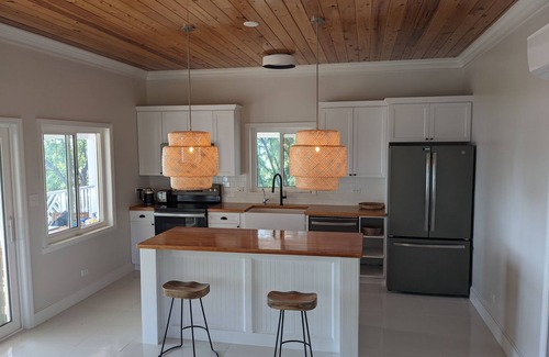 Morris Settlement House | TLSea Private Beachfront Home with Gazebo on Sunset Beach