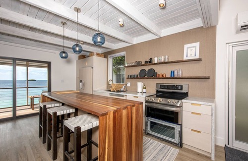 Savannah Sound Cottage | Touch of Class Cottage, A Beachfront Cottage on the Warm Calm Caribbean