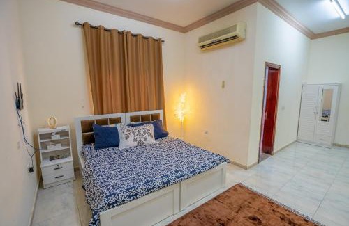 Abu Dhabi House | Tourist family and couple rooms abudhabi Baith Al Jannah LLC Private Family Rooms - Attached Washroom - VL01