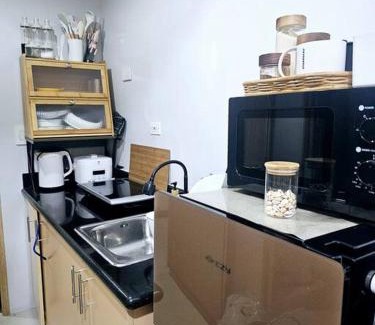 Santo Cristo House | Tower 5-2551 K3Staycations at The Grass Residences