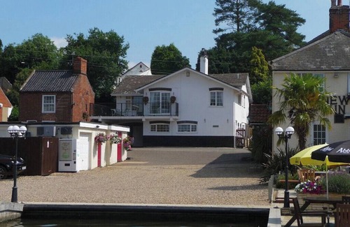 Irstead House | Tracara in Horning, riverside location sleeps 8. Family & Pet friendly.