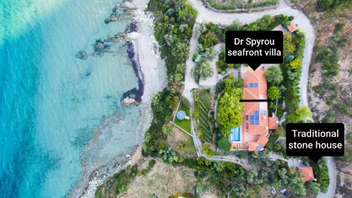 Agii Apostoli House | Traditional stone house by the sea.