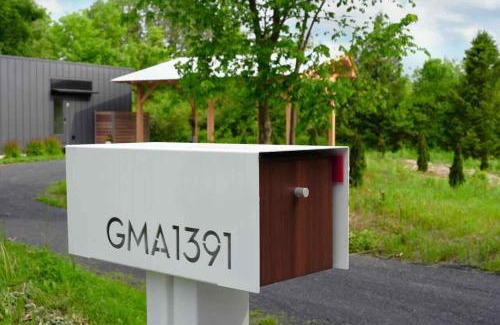 North Hero House | Tradstuga modern lakefront tree cottage with sauna