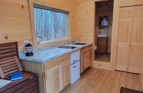Dorchester Apartment | Trailside Stays - Tiny House in the Woods-Escape to Nature. Blue Jay