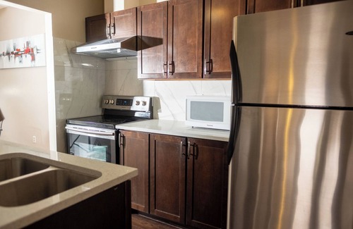 Crescent Heights House | Tranquil Bow River Room: Near River's Beauty house