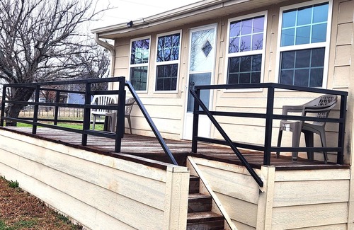 Eastland House | Tranquil Lake House on 2 Acres: Pet-Friendly with Stunning Lake Views.