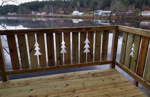 Wells House | Tranquil lakefront home sits above the lake with an unobstructed view