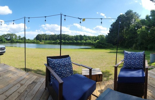 Orangeburg County Apartment | Tranquil Studio Cottage features a remodeled full kitchen, heated pool,& fishing
