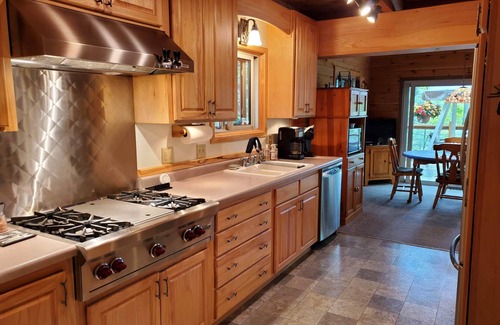 Markville Cabin | Tranquil year round retreat on small quiet lake that has WiFi, a HotTub & Sauna