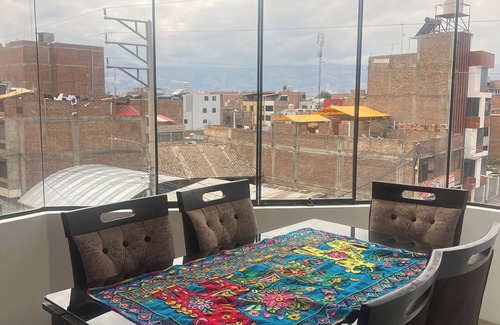 Chupaca Apartment | Travel's house in Cupaca has a shared living room and kitchen. For all V