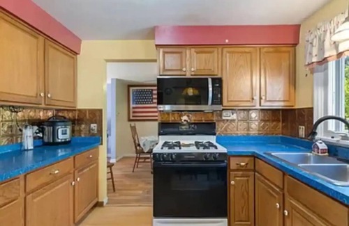 Pittsford House | Traveler’s Wellness Oasis - gorgeous pool, fish pond, and hot tub!