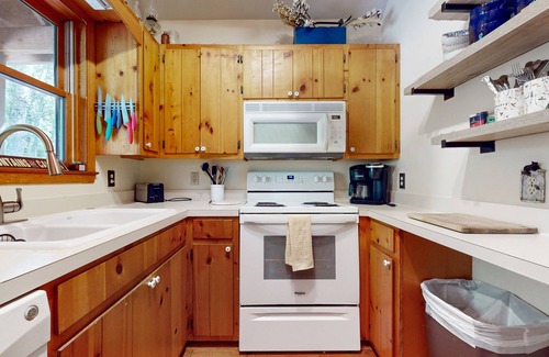 Mill Ridge Cabin | Tree-lined, dog-friendly cabin in ideal location with deck, wood stove & pool