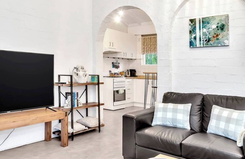 Glenelg North Apartment | Treetops at Glenelg Coastal Stay with Leafy Patio