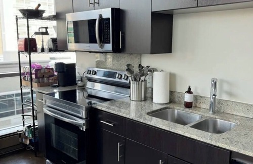 Beltline Condo | Trendy 2BR condo with downtown Calgary views, ideal for stylish getaways!