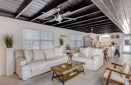 Indian Waterways House | Trendy canal-front home with dock, full kitchen, central AC, & washer/dryer