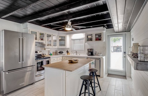 Indian Waterways House | Trendy canal-front home with dock, full kitchen, central AC, & washer/dryer