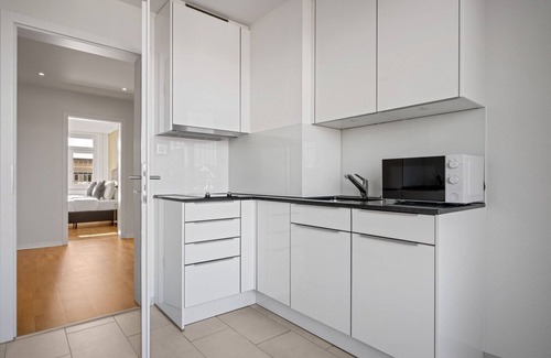 Sihlfeld Apartment | Trendy Wiedikon 4.5 Room w/Storage & W/D, 1 min to Market, by Blueground