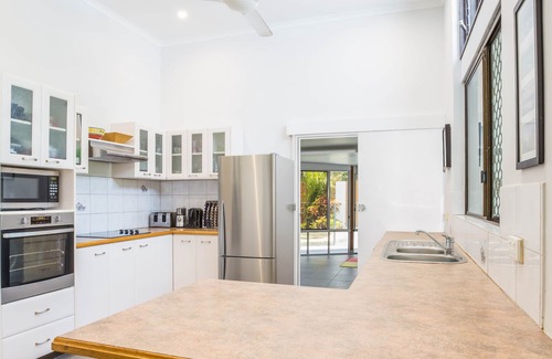 Holloways Beach House | Tropical Beachside Home - Pool, Wifi