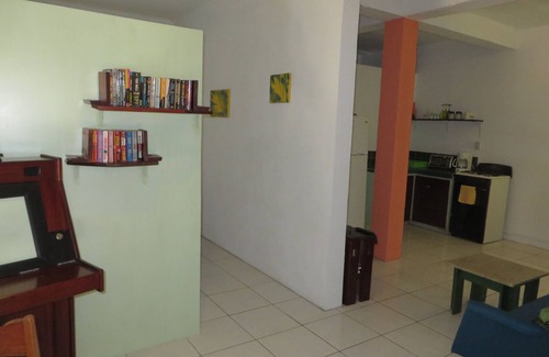 Placencia Apartment | Tropical garden experience in colorful setting in heart of Maya Beach