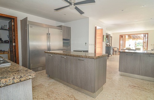 Punta Cana Villa | Tropical Golf View Villa. Steps to the ocean with a Gym and Theater-game room.