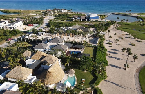 Punta Cana Villa | Tropical Golf View Villa. Steps to the ocean with a Gym and Theater-game room.