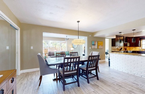 Cocoa Isles House | Tropical home with pool, lovely patio & game room - walk to beach