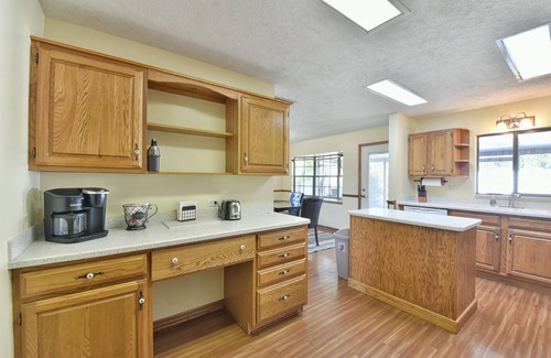 Fort King District House | Tropical Pool Home in SE Ocala! Air Hockey, Foosball, Brand New Kitchen & Floors