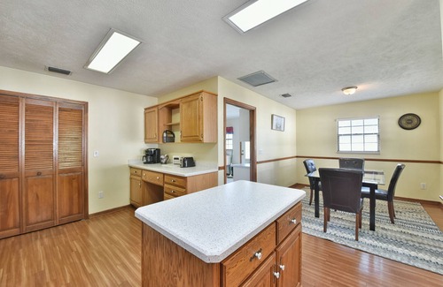Fort King District House | Tropical Pool Home in SE Ocala! Air Hockey, Foosball, Brand New Kitchen & Floors
