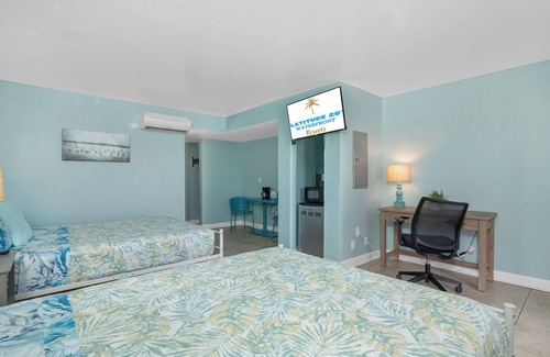 Palm Isles Resort | Tropical Two Queen Bed Room at Fort Myers Beach