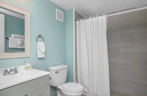 Palm Isles Resort | Tropical Two Queen Bed Room at Fort Myers Beach